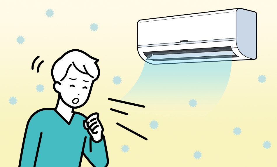 くしゃみしている男性